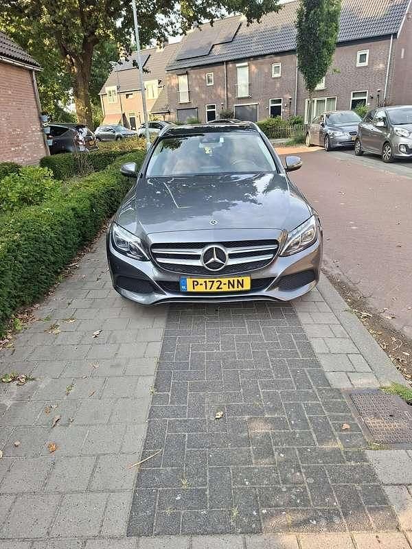 Grijs Gebruikt 2017 Mercedes C220 Business Stationwagen | € 13.500 (Goede deal) - Afbeelding 1/4