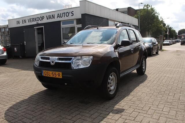 Bruin Gebruikt 2011 Dacia Duster Ambiance SUV | € 5.685 (Eerlijke prijs) - Afbeelding 1/4
