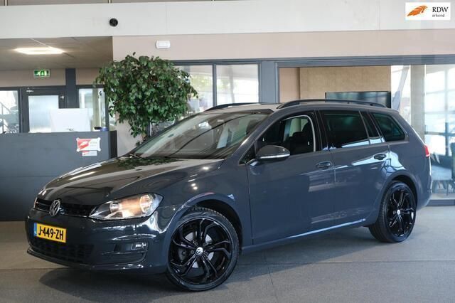 Grijs, metallic lak Gebruikt 2014 VW Golf VII Stationwagen | € 11.950 (Eerlijke prijs) - Afbeelding 1/4