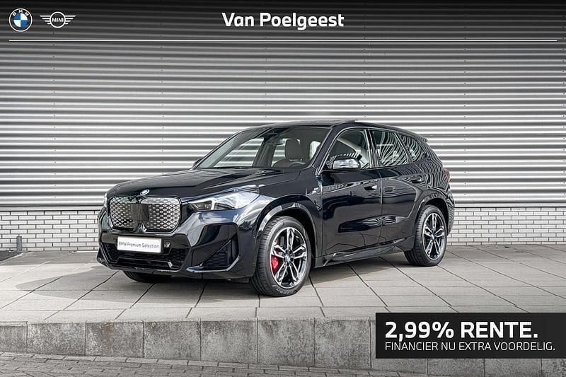 Zwart Gebruikt 2024 BMW iX1 Comfort Edition SUV | € 42.900 (Goede deal) - Afbeelding 1/4