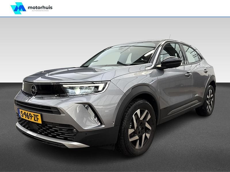 Grijs Occasion 2023 Opel Mokka-e Elegance SUV | € 20.940 - Afbeelding 1/4
