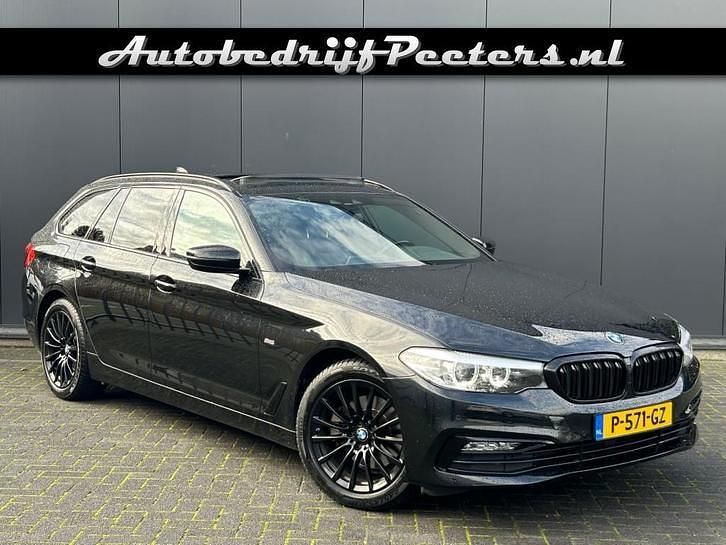 Zwart Gebruikt 2018 BMW 520 Sport Line Stationwagen | € 24.950 (Super prijs) - Afbeelding 1/4