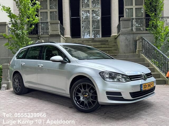 Grijs, metallic lak Gebruikt 2014 VW Golf VII Comfortline Stationwagen | € 7.445 (Eerlijke prijs) - Afbeelding 1/4