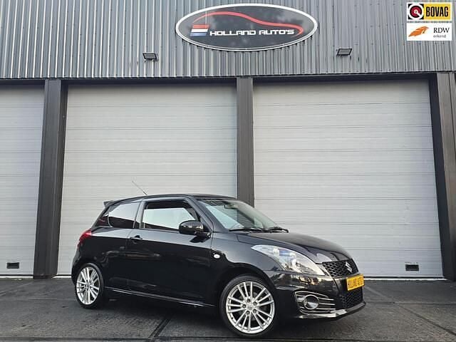 Zwart (metallic) Gebruikt 2013 Suzuki Swift Sport Hatchback | € 8.950 (Eerlijke prijs) - Afbeelding 1/4