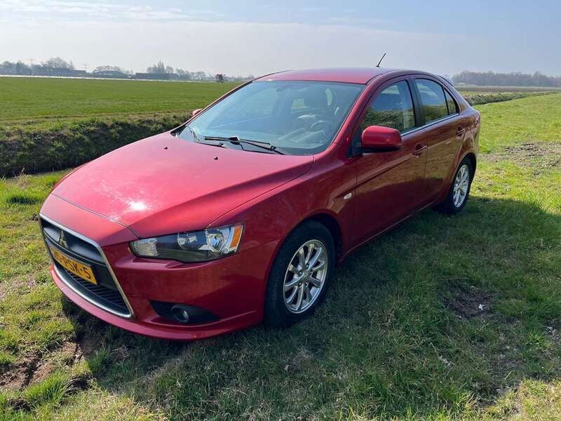 Rood Gebruikt 2011 Mitsubishi Lancer Edition Hatchback | € 6.900 (Eerlijke prijs) - Afbeelding 1/4