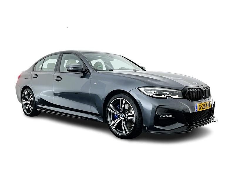 Grijs (metallic) Gebruikt 2019 BMW 330e Executive Sedan | € 25.445 (Iets duurder) - Afbeelding 1/4