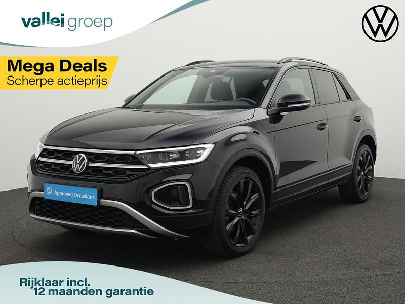Zwart Gebruikt 2022 VW T-Roc Style SUV | € 29.900 (Eerlijke prijs) - Afbeelding 1/4