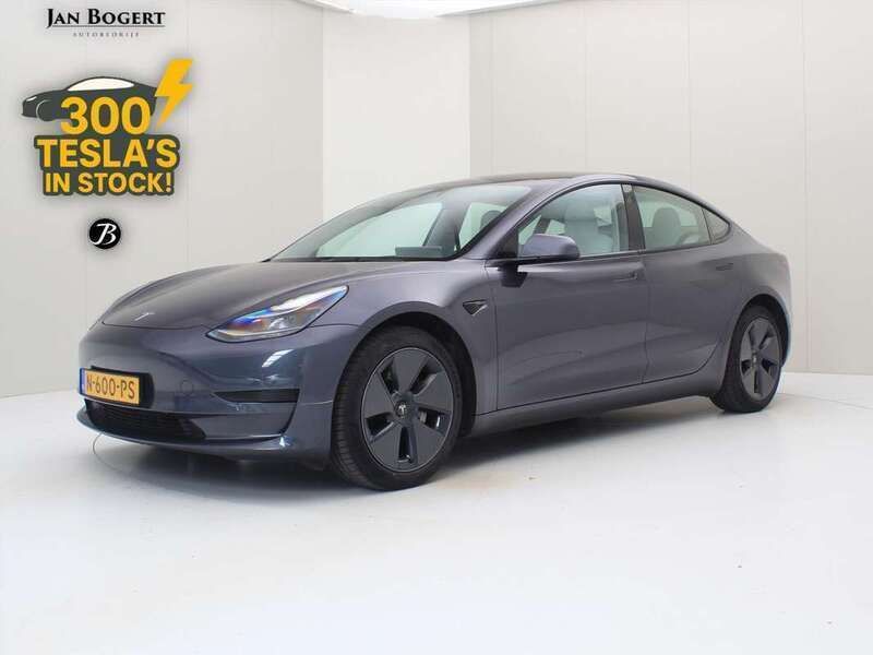 Grijs Gebruikt 2021 Tesla Model 3 Standard Range Sedan | € 22.900 (Eerlijke prijs) - Afbeelding 1/4