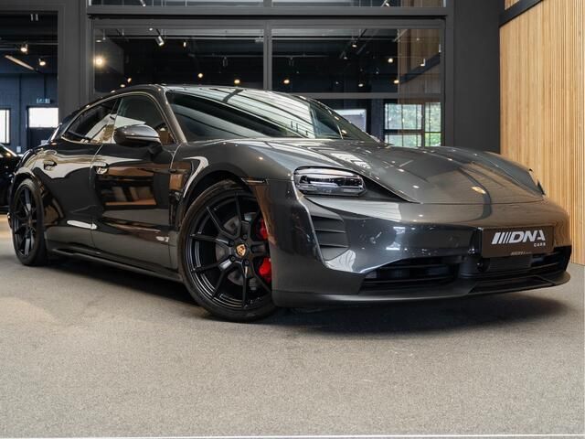 Grijs, metallic lak Gebruikt 2023 Porsche Taycan Performance Package Sedan | € 99.995 - Afbeelding 1/4