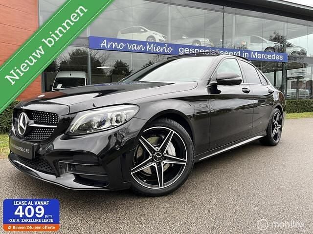 Zwart Gebruikt 2018 Mercedes C180 AMG line Sedan | € 25.500 (Eerlijke prijs) - Afbeelding 1/4