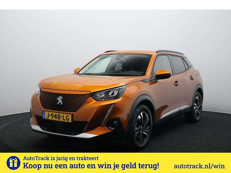 Oranje Gebruikt 2020 Peugeot e-2008 Allure SUV | € 15.750 (Eerlijke prijs) - Afbeelding 1/4