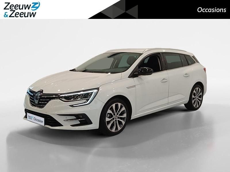 Blanc glacier 369 Gebruikt 2024 Renault Mégane GrandTour Techno Stationwagen | € 22.940 (Goede deal) - Afbeelding 1/4