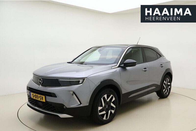 Grijs Gebruikt 2023 Opel Mokka-e SUV | € 23.945 (Iets duurder) - Afbeelding 1/4