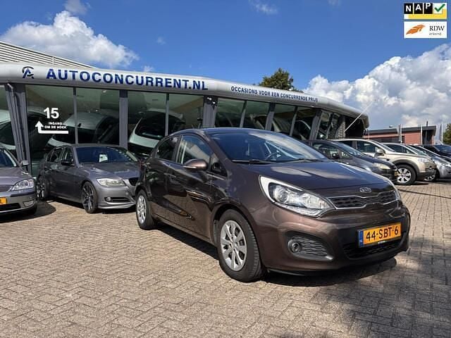 Bruin Gebruikt 2011 Kia Rio Plus Hatchback | € 4.499 (Eerlijke prijs) - Afbeelding 1/4