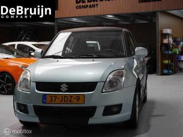 Blauw Gebruikt 2009 Suzuki Swift Comfort Hatchback | € 1.000 (Super prijs) - Afbeelding 1/4