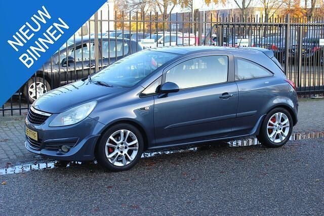 Grijs Gebruikt 2007 Opel Corsa Business Hatchback | € 1.000 (Super prijs) - Afbeelding 1/4
