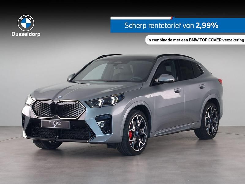 Grijs, metallic lak Gebruikt 2025 BMW iX2 M Sport SUV | € 49.950 - Afbeelding 1/4