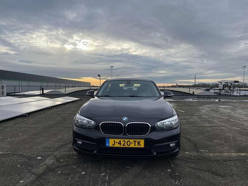 Zwart Gebruikt 2016 BMW 116 Hatchback | € 6.300 (Iets duurder) - Afbeelding 1/4