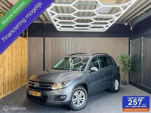 Grijs Gebruikt 2015 VW Tiguan Sport SUV | € 14.900 (Eerlijke prijs) - Afbeelding 1/4