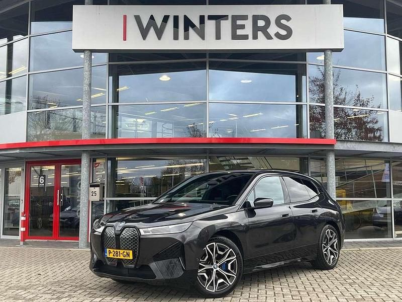 Grijs Gebruikt 2022 BMW iX Executive SUV | € 39.885 (Goede deal) - Afbeelding 1/4