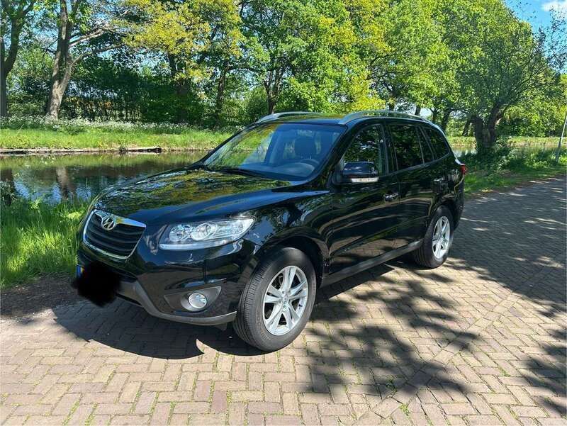 Zwart Gebruikt 2010 Hyundai Santa Fe Style SUV | € 7.950 (Eerlijke prijs) - Afbeelding 1/4