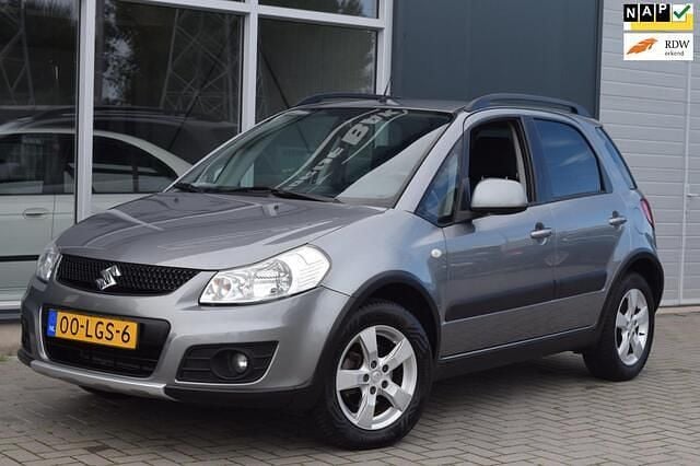 Grijs Gebruikt 2010 Suzuki SX4 Exclusive MPV | € 3.999 (Goede deal) - Afbeelding 1/4