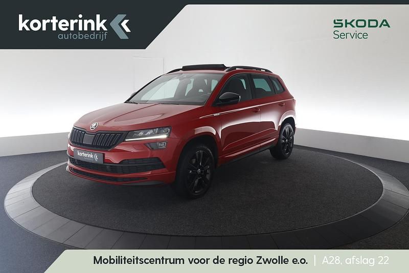 Rood, metallic lak Gebruikt 2019 Skoda Karoq Business Line SUV | € 22.890 (Iets duurder) - Afbeelding 1/4