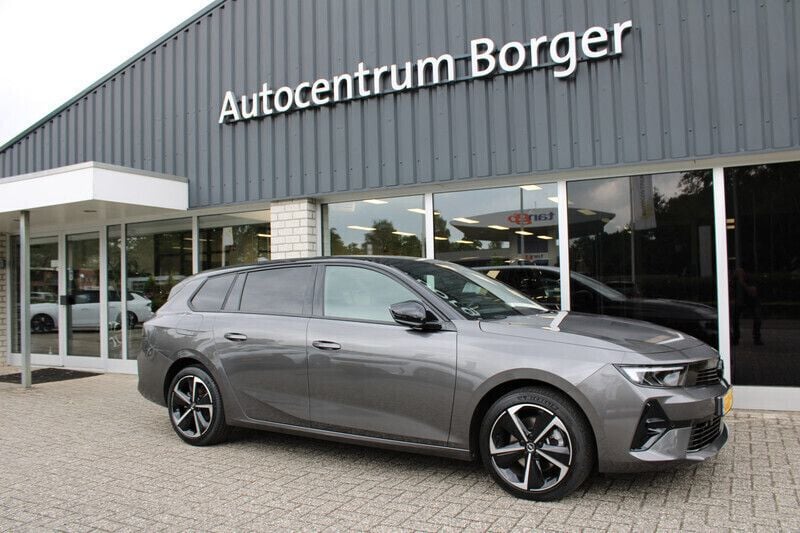 Grijs Gebruikt 2024 Opel Astra Stationwagen | € 31.899 (Eerlijke prijs) - Afbeelding 1/4