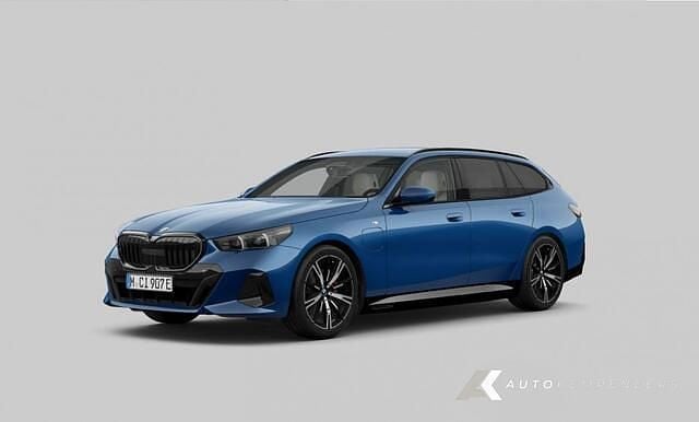Blauw Gebruikt 2024 BMW 530e M Sport Stationwagen | € 62.950 - Afbeelding 1/4