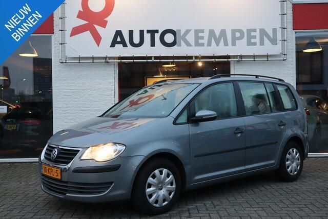 Grijs, metallic lak Gebruikt 2010 VW Touran Trendline MPV | € 2.250 (Duur) - Afbeelding 1/4