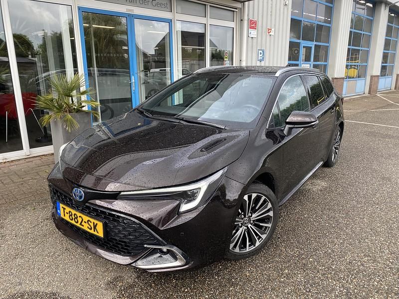 Occasion Toyota Corolla Edition 200 PK (147 kW) 2023 Bruin, metallic lak Stationwagen