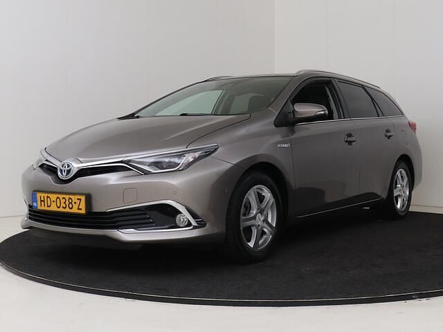 Bruin Gebruikt 2015 Toyota Auris Touring Sports Stationwagen | € 13.950 (Eerlijke prijs) - Afbeelding 1/4