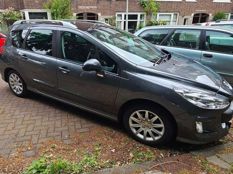 Grijs Gebruikt 2009 Peugeot 308 Stationwagen | € 2.499 (Eerlijke prijs) - Afbeelding 1/4