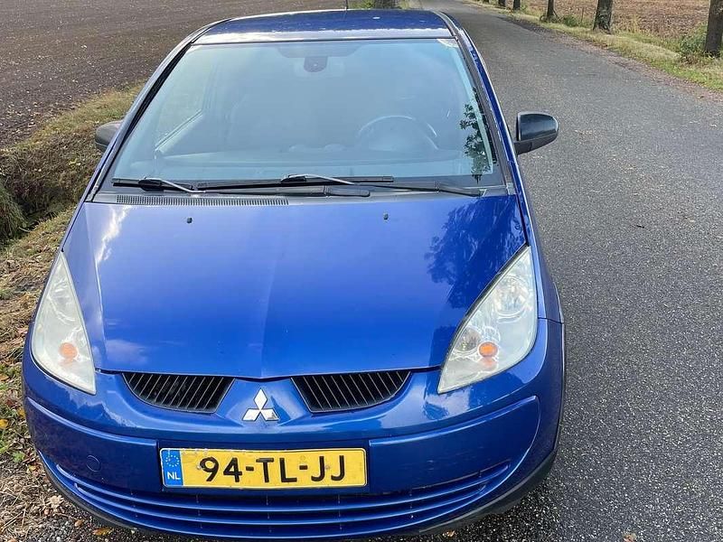 Blauw Gebruikt 2006 Mitsubishi Colt Hatchback | € 1.250 (Eerlijke prijs) - Afbeelding 1/4
