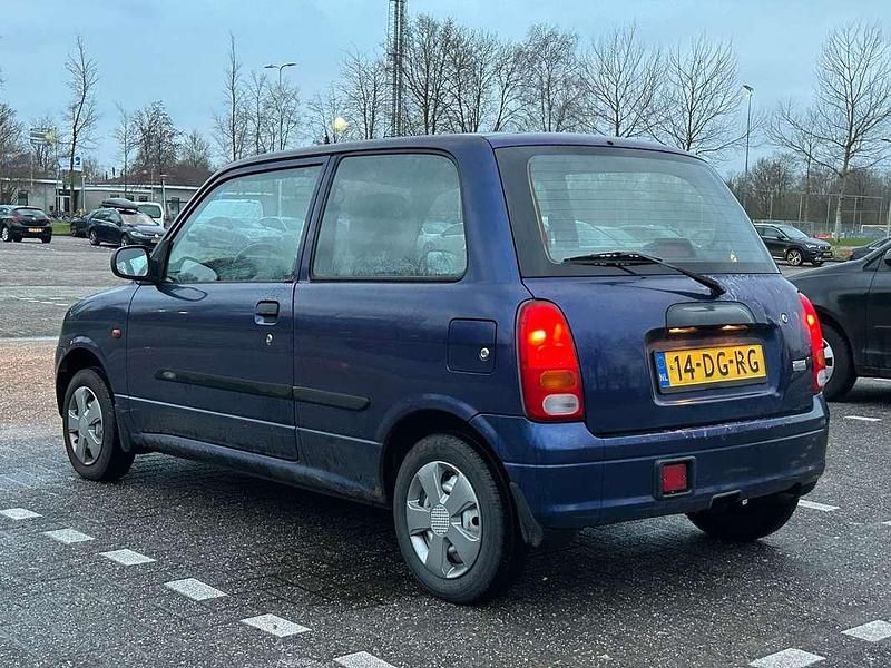 Occasion Daihatsu Cuore 56 PK (41 kW) 1999 Blauw Hatchback