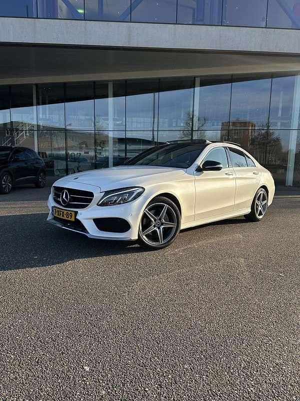 Wit Occasion 2014 Mercedes C200 AMG Sedan | € 21.500 (Iets duurder) - Afbeelding 1/4
