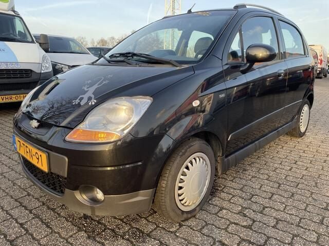 Zwart, metallic lak Gebruikt 2009 Chevrolet Matiz Hatchback | € 1.950 (Eerlijke prijs) - Afbeelding 1/4