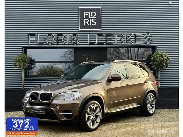 Bruin Gebruikt 2010 BMW X5 Exclusive SUV | € 22.950 (Eerlijke prijs) - Afbeelding 1/4