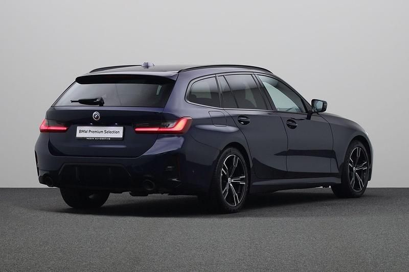 Occasion BMW 330e Comfort Edition 184 PK (135 kW) 2023 Blauw Stationwagen