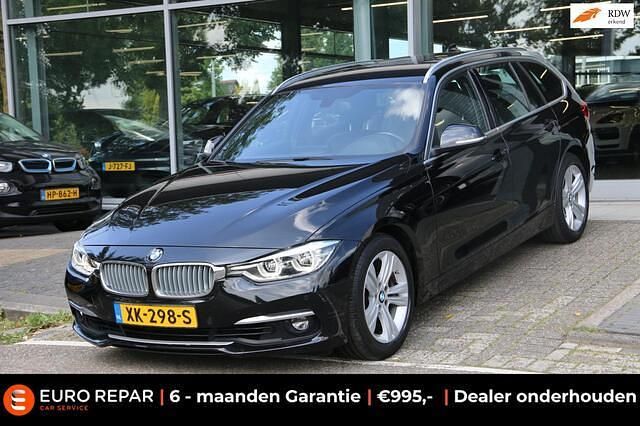 Zwart Gebruikt 2019 BMW 320 Luxury Line Stationwagen | € 19.295 (Super prijs) - Afbeelding 1/4
