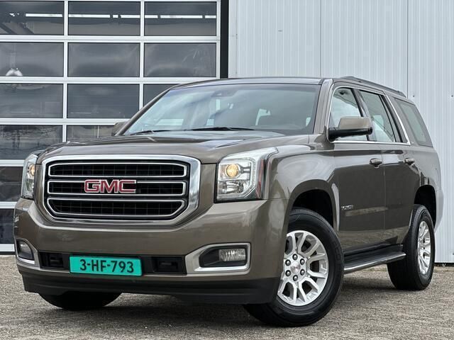 Bruin, metallic lak Gebruikt 2015 GMC Yukon SUV | € 42.500 - Afbeelding 1/4