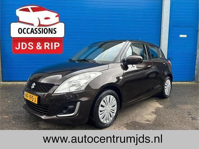 Bruin Gebruikt 2015 Suzuki Swift Comfort Hatchback | € 9.950 (Eerlijke prijs) - Afbeelding 1/4
