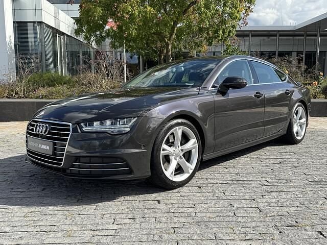 Grijs (parellak) Gebruikt 2014 Audi A7 Sportback Premium Hatchback | € 31.950 - Afbeelding 1/4