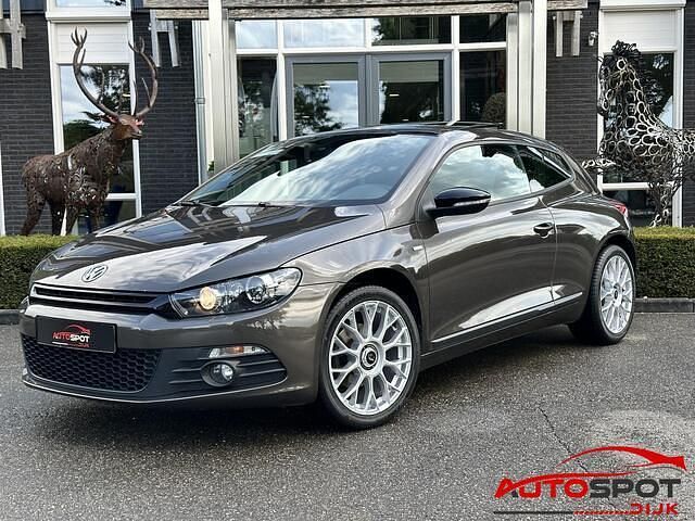 Bruin Gebruikt 2012 VW Scirocco Highline Coupé | € 10.950 (Duur) - Afbeelding 1/4