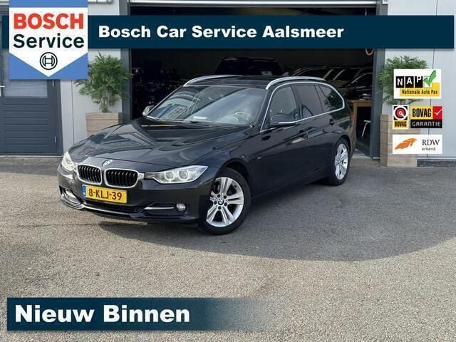 Zwart Gebruikt 2013 BMW 316 Executive Stationwagen | € 6.850 (Goede deal) - Afbeelding 1/4