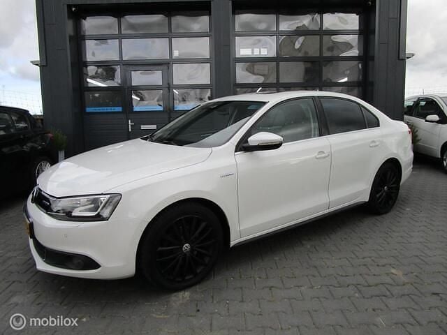 Wit Gebruikt 2013 VW Jetta Highline Sedan | € 5.950 (Eerlijke prijs) - Afbeelding 1/4