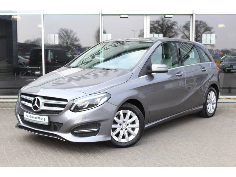 Grijs Gebruikt 2016 Mercedes B180 Ambition MPV | € 18.450 (Eerlijke prijs) - Afbeelding 1/4
