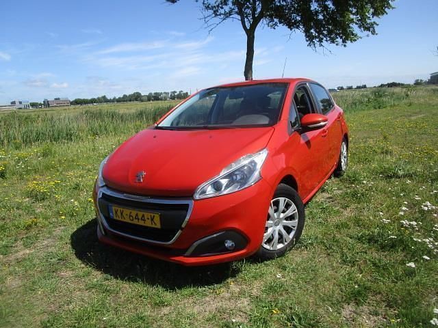 Oranje Occasion 2016 Peugeot 208 Hatchback | € 2.500 (Super prijs) - Afbeelding 1/4