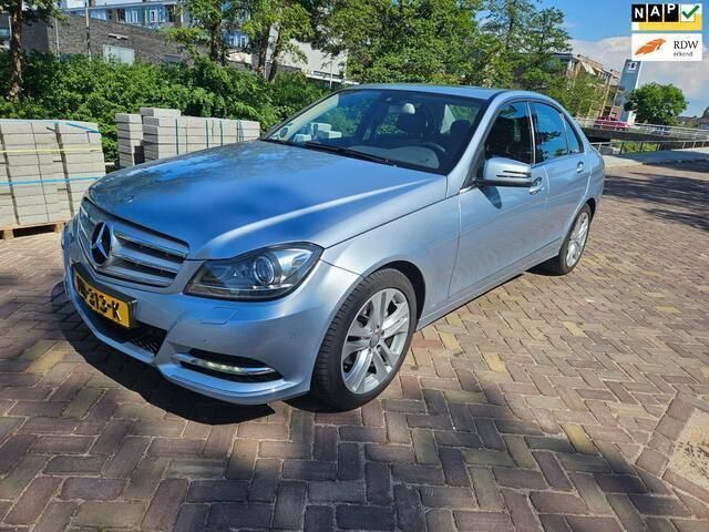 Grijs Gebruikt 2013 Mercedes C180 Ambition Sedan | € 14.950 (Eerlijke prijs) - Afbeelding 1/4