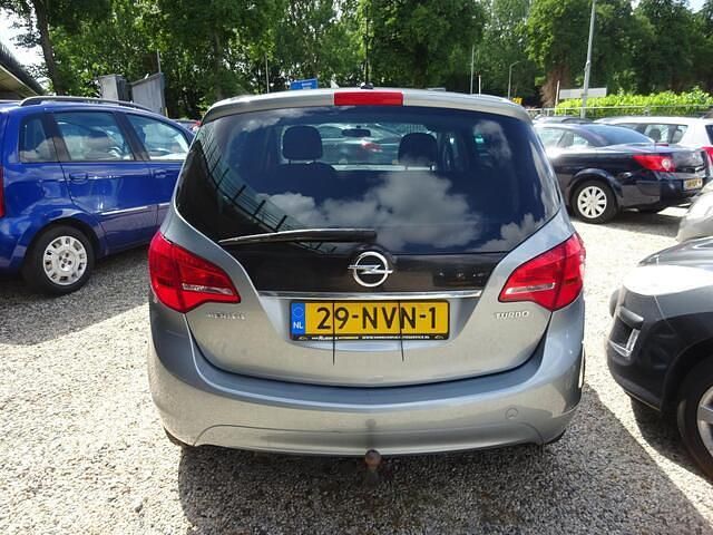 Grijs Gebruikt 2010 Opel Meriva Cosmo MPV | € 3.995 (Eerlijke prijs) - Afbeelding 1/4